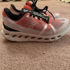 On Running Coral and White Athletic Shoes